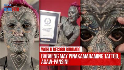 Yung Babaeng May Tattoo .